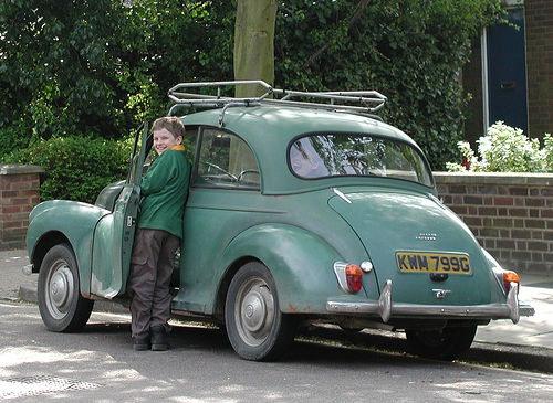 Boy entering car